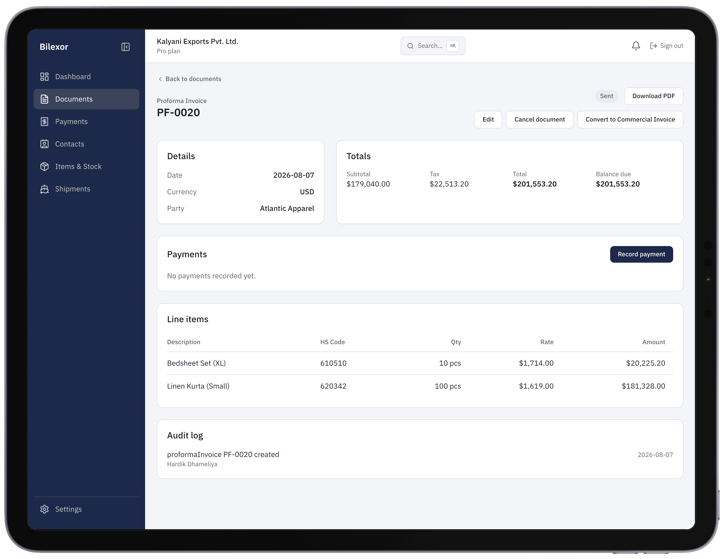 Bilexor proforma invoice PF-0020 detail on iPad with totals, line items including HS codes, Record payment, and an audit entry